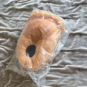 Plush Foot-Shaped Pillow with Yellow Toenail Accents